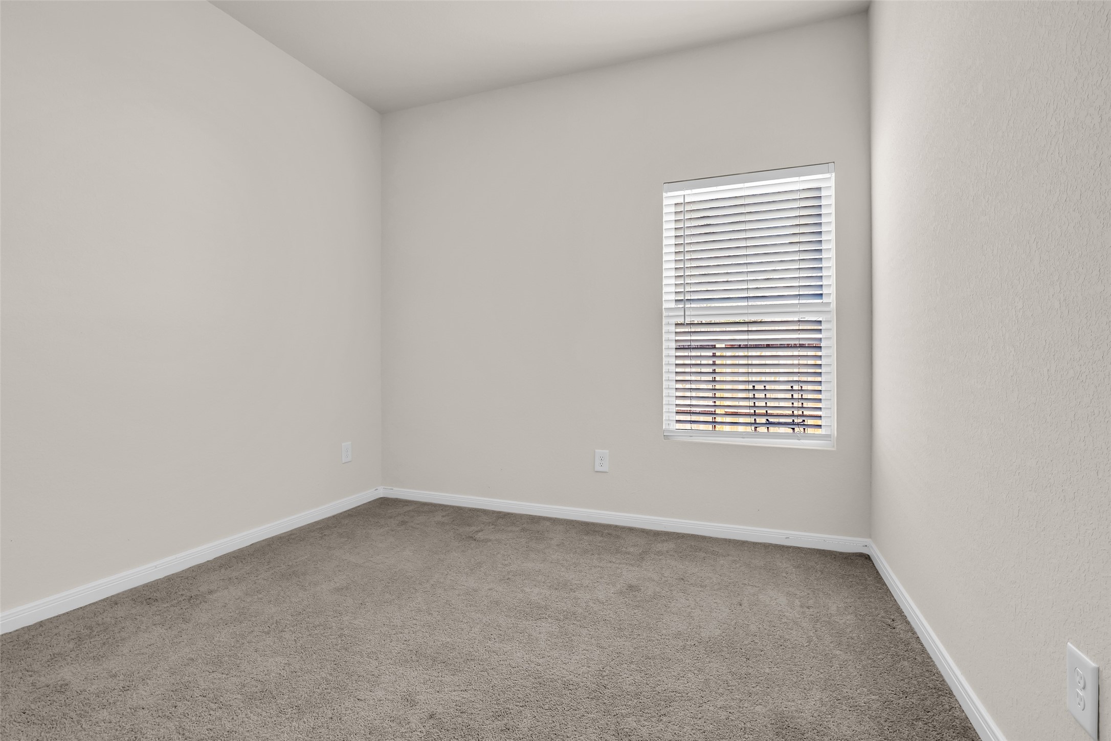 2511 17th Street Hempstead, TX 77445 - Photo 19 of 23 an empty room with a window