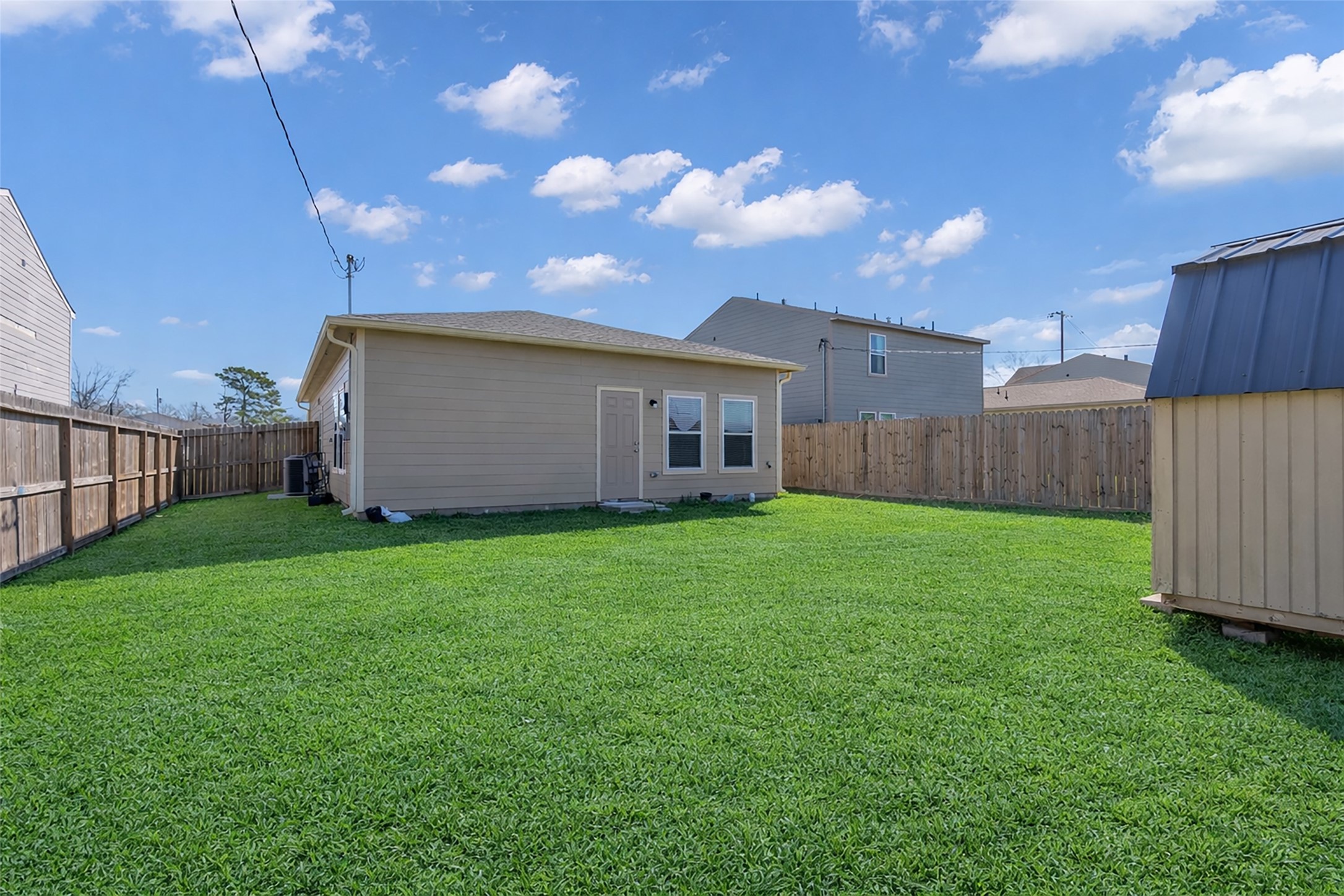 2511 17th Street Hempstead, TX 77445 - Photo 21 of 23 a view of a house with backyard and garden