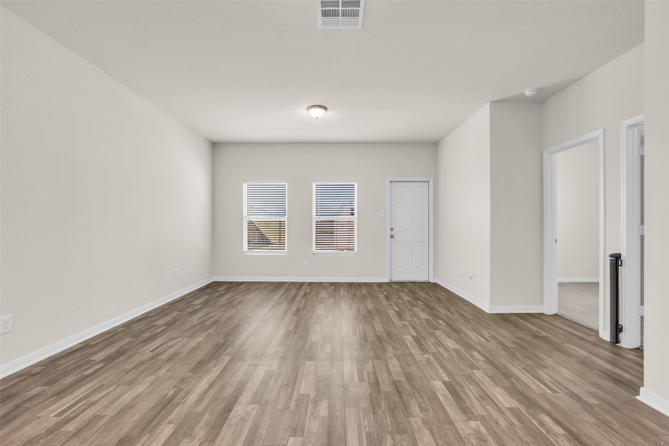 2511 17th Street Hempstead, TX 77445 - Photo 7 of 23 a view of an empty room and wooden floor