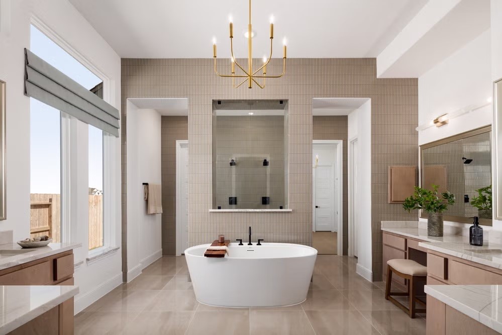 6414 Seville Street Manvel, TX 77578 - Photo 6 of 9 a spacious bathroom with a sink mirror and a bathtub