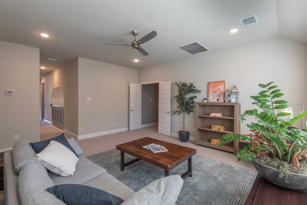 16650 Nightshade Road Frisco, TX 75033 - Photo 32 of 40 a living room with furniture and a potted plant