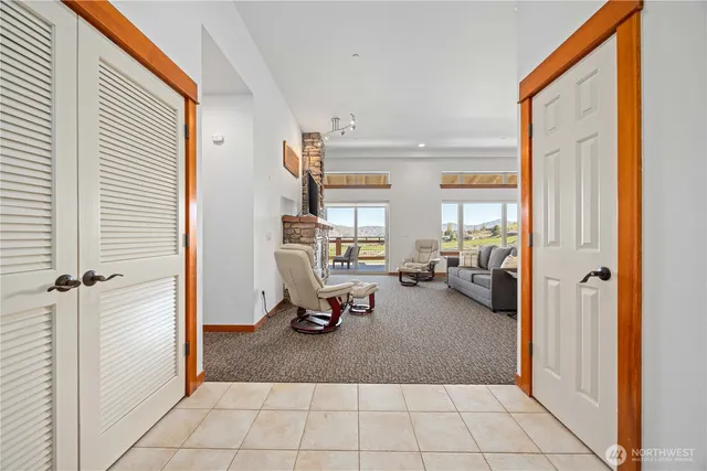 a view of a livingroom with couch and a window