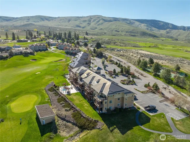 a view of a city with an ocean