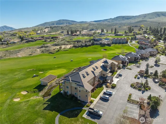 an aerial view of a house with a garden