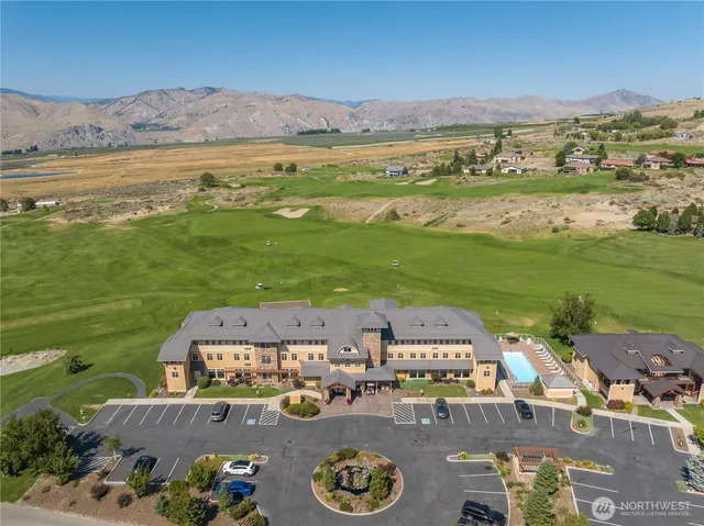 an aerial view of a house with a garden