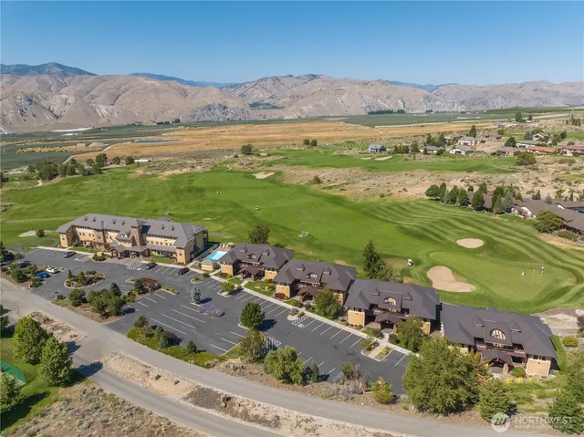 an aerial view of a house with a garden