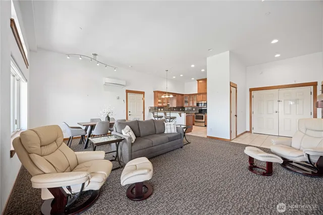a living room with furniture and a table
