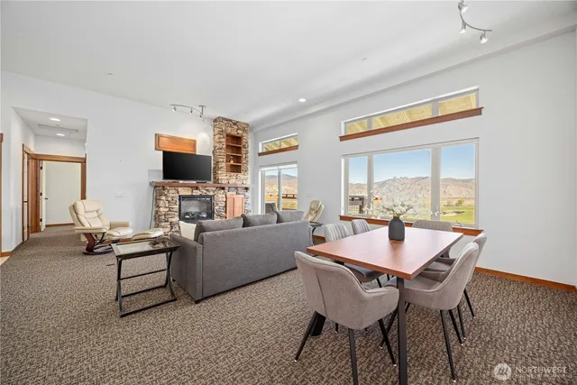 a view of a dining room with furniture window and outside view