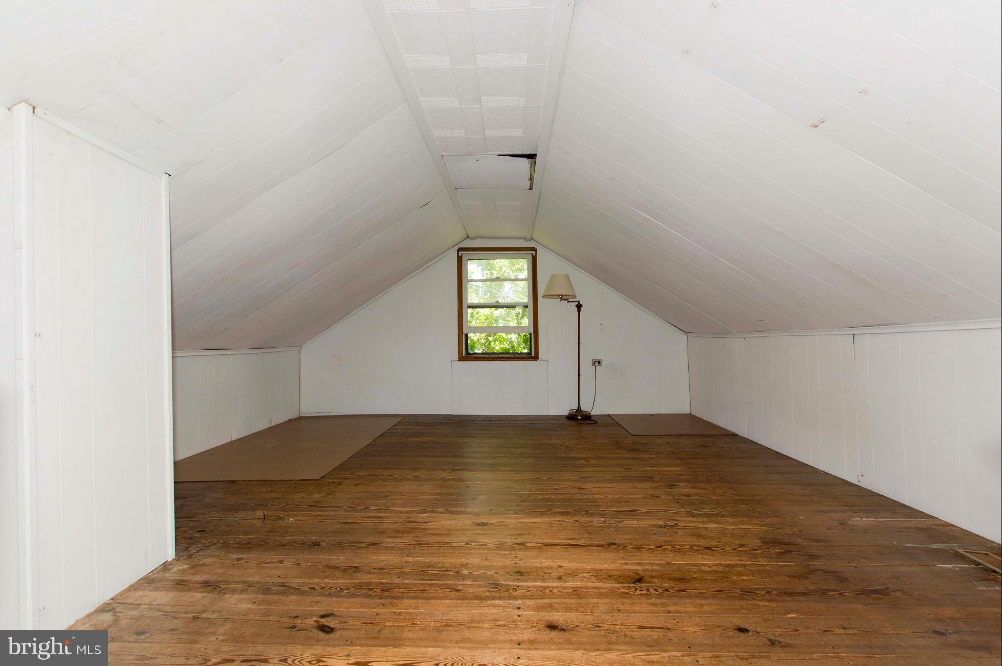 1007 Overbrook Road Baltimore, MD 21239 - Photo 24 of 30 a view of an empty room with window