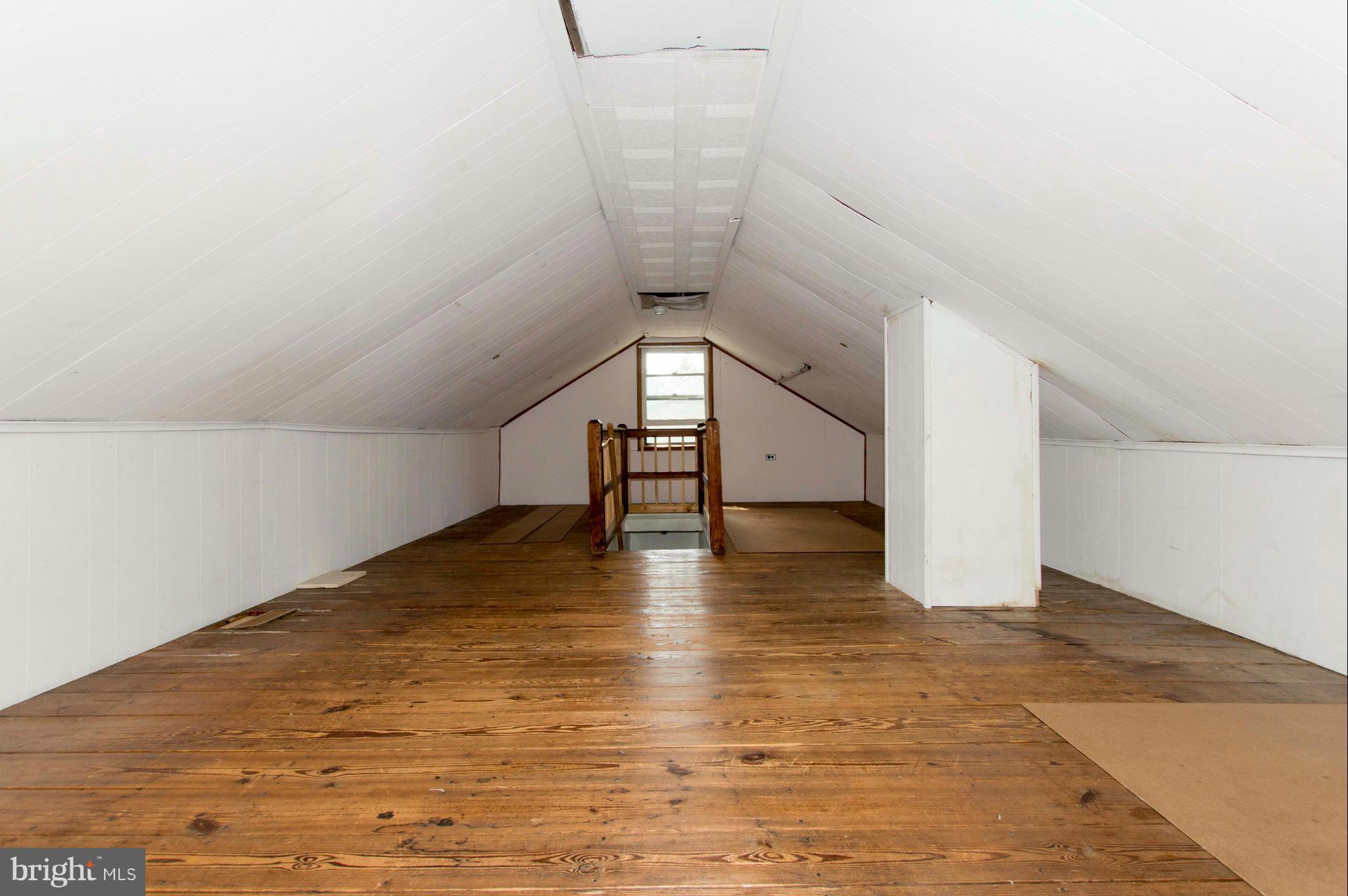 1007 Overbrook Road Baltimore, MD 21239 - Photo 25 of 30 a view of empty room with wooden floor