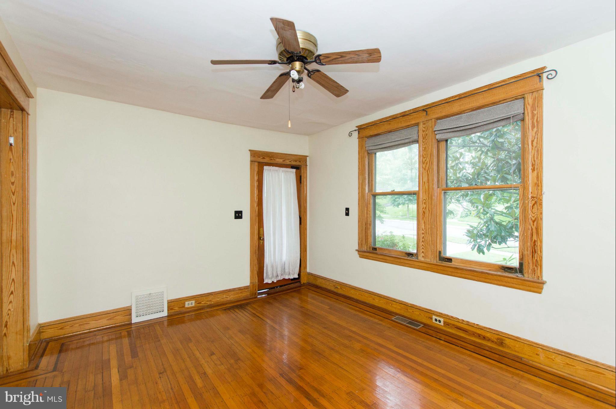 1007 Overbrook Road Baltimore, MD 21239 - Photo 5 of 30 a view of an empty room with a window