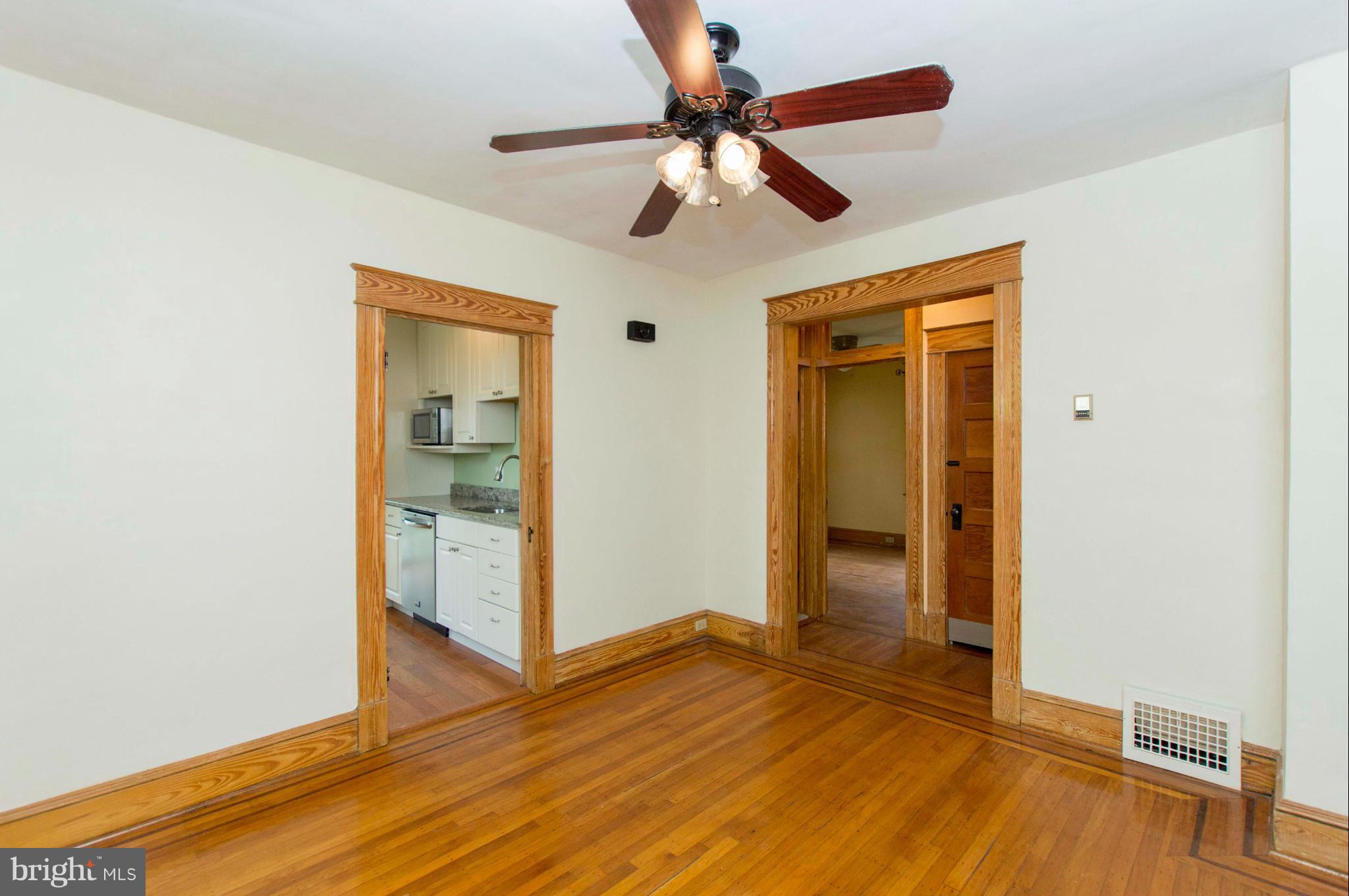1007 Overbrook Road Baltimore, MD 21239 - Photo 10 of 30 a view of empty room with wooden floor