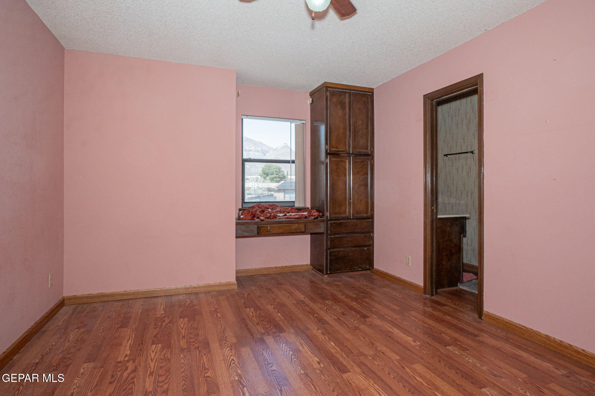 4643 R L Shoemaker Drive El Paso, TX 79924 - Photo 14 of 24 wooden floor in an empty room