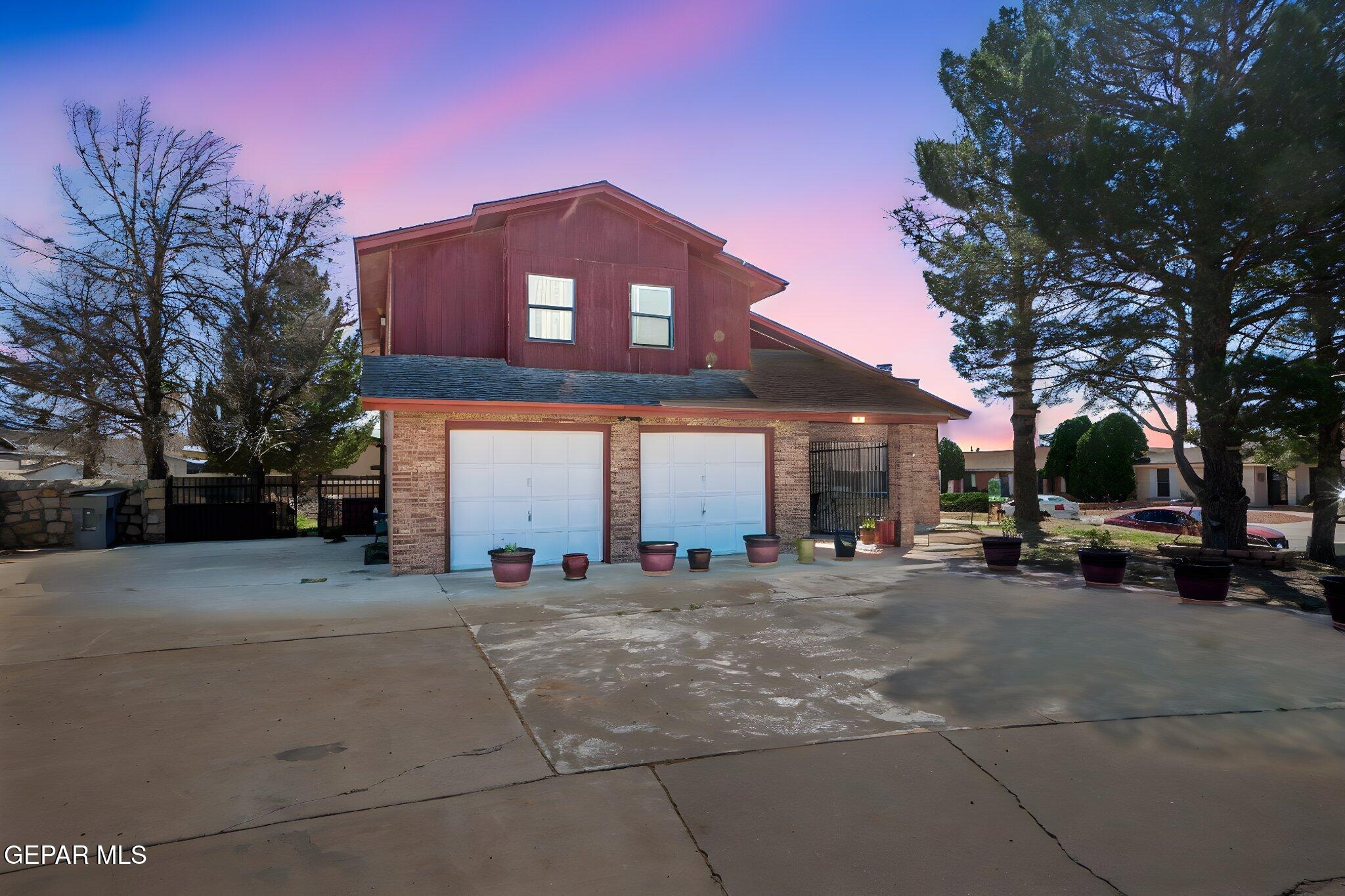 4643 R L Shoemaker Drive El Paso, TX 79924 - Photo 2 of 24 a large building with a large tree in front of it