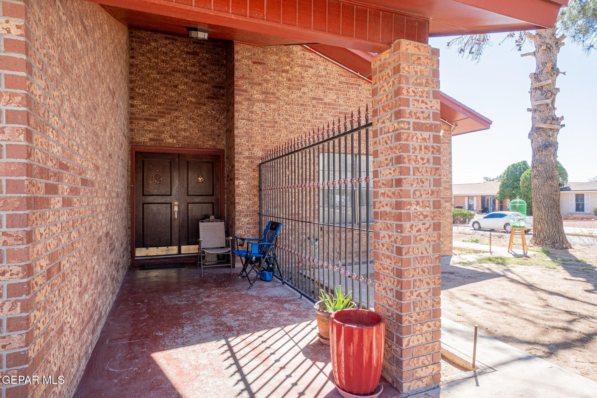 4643 R L Shoemaker Drive El Paso, TX 79924 - Photo 3 of 24 a view of a chairs and table in backyard