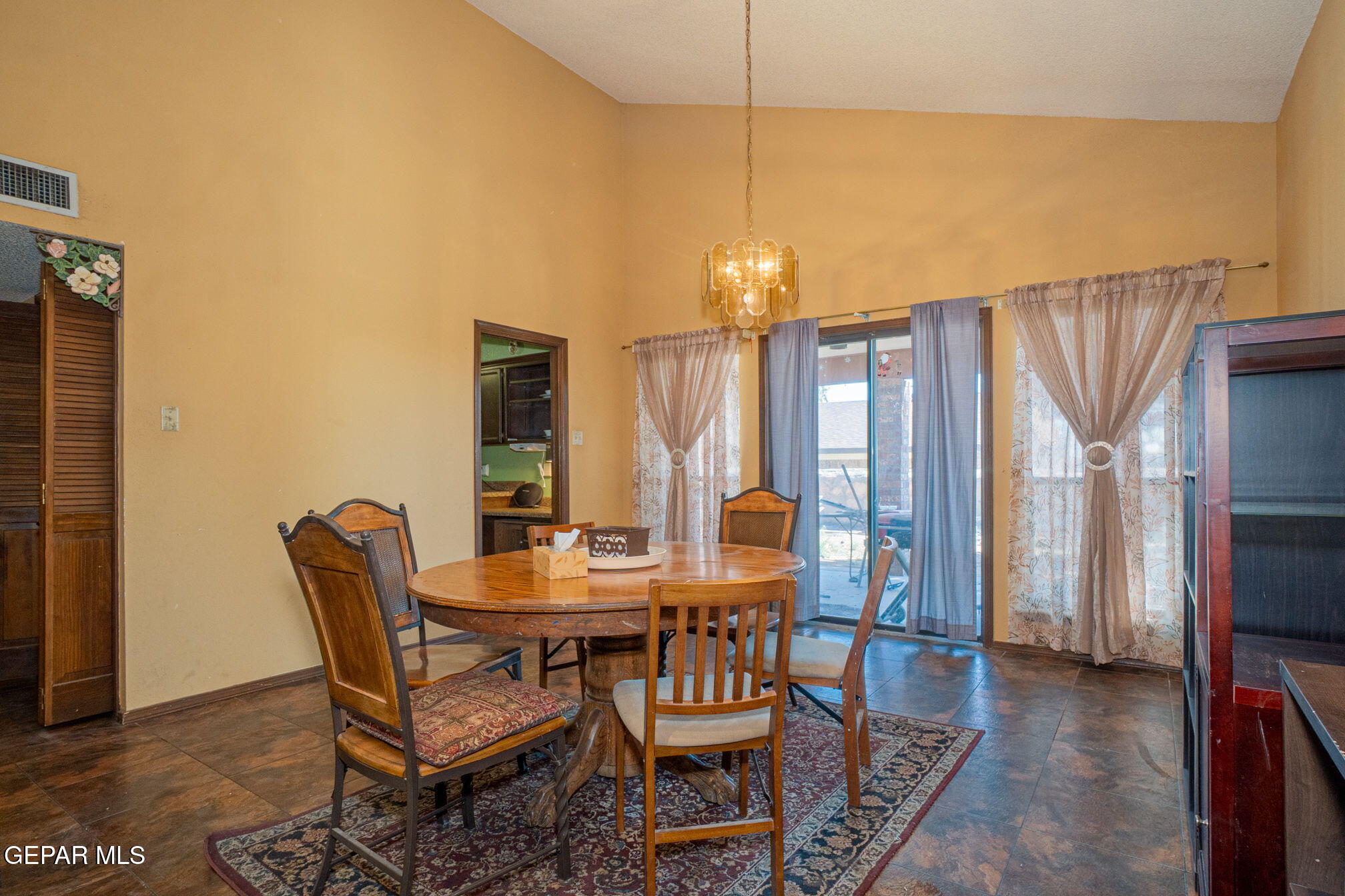 4643 R L Shoemaker Drive El Paso, TX 79924 - Photo 5 of 24 a view of a dining room with furniture window and outside view