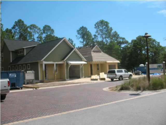 45 Sextant Lane Santa Rosa Beach, FL 32459 - Photo 5 of 5 a front view of a house with a yard and garage