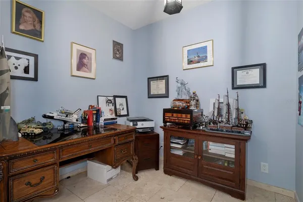 a view of a hallway with wooden floor and closet