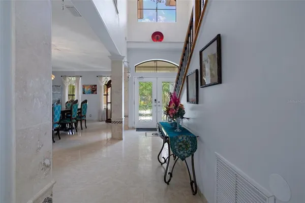 a view of a dining room with furniture window and outside view