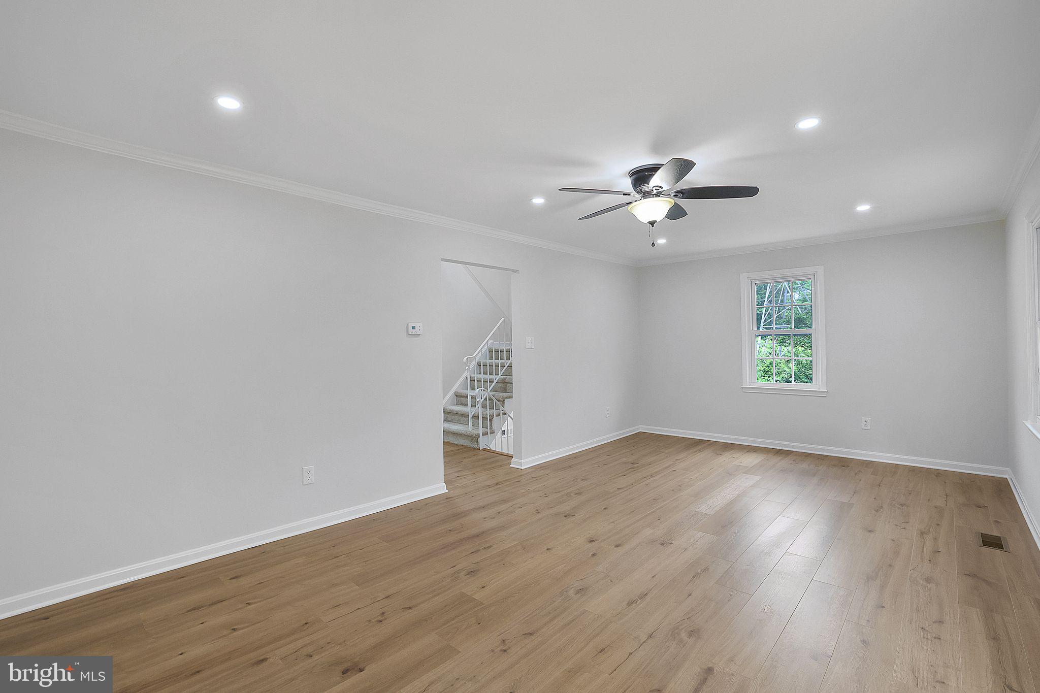 7760 Euclid Way Springfield, VA 22153 - Photo 14 of 50 wooden floor in an empty room with a window