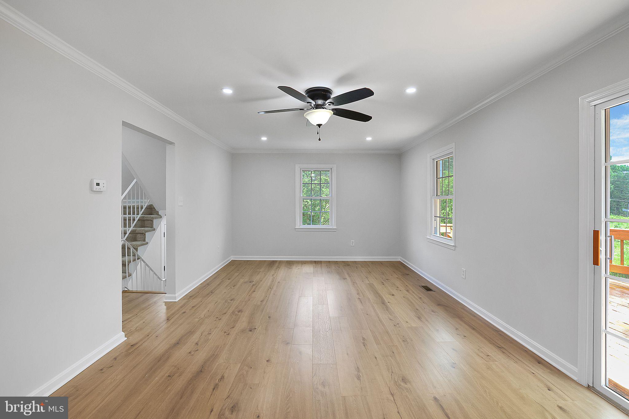 7760 Euclid Way Springfield, VA 22153 - Photo 15 of 50 wooden floor in an empty room with a window