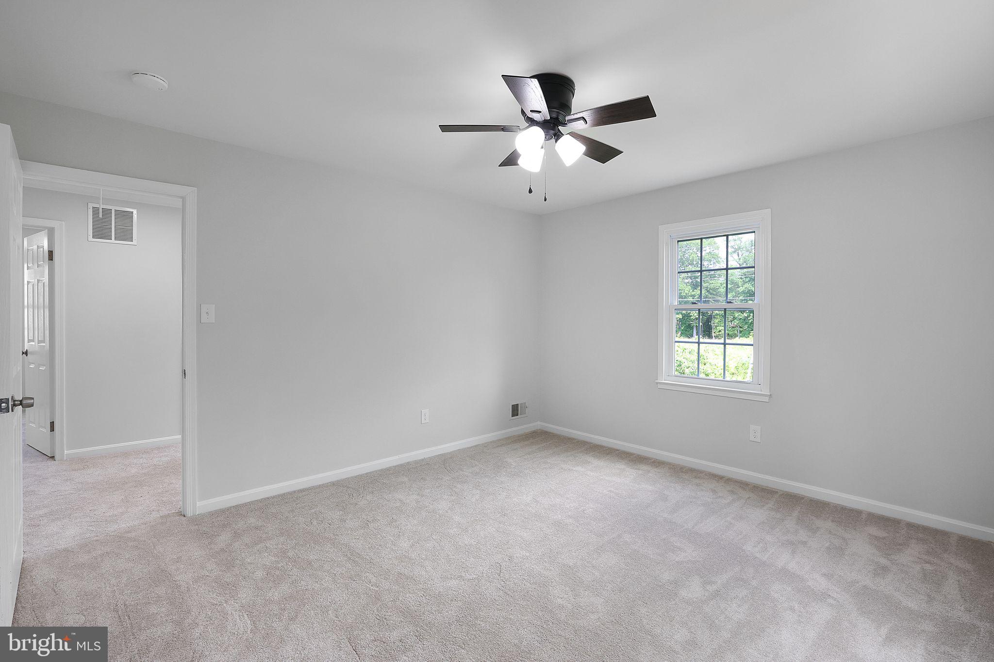 7760 Euclid Way Springfield, VA 22153 - Photo 20 of 50 a view of an empty room with a window