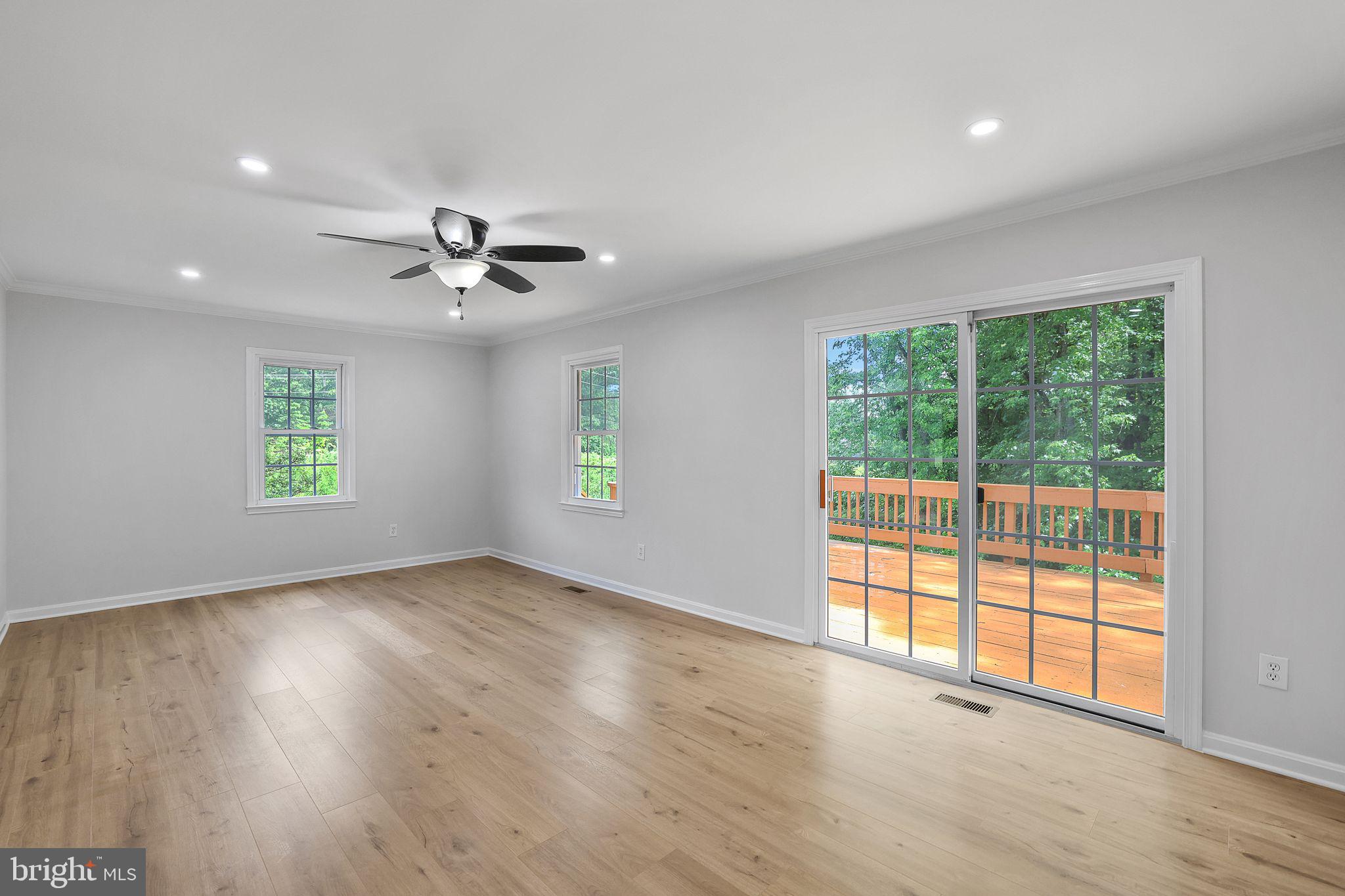 7760 Euclid Way Springfield, VA 22153 - Photo 2 of 50 wooden floor in an empty room with a window