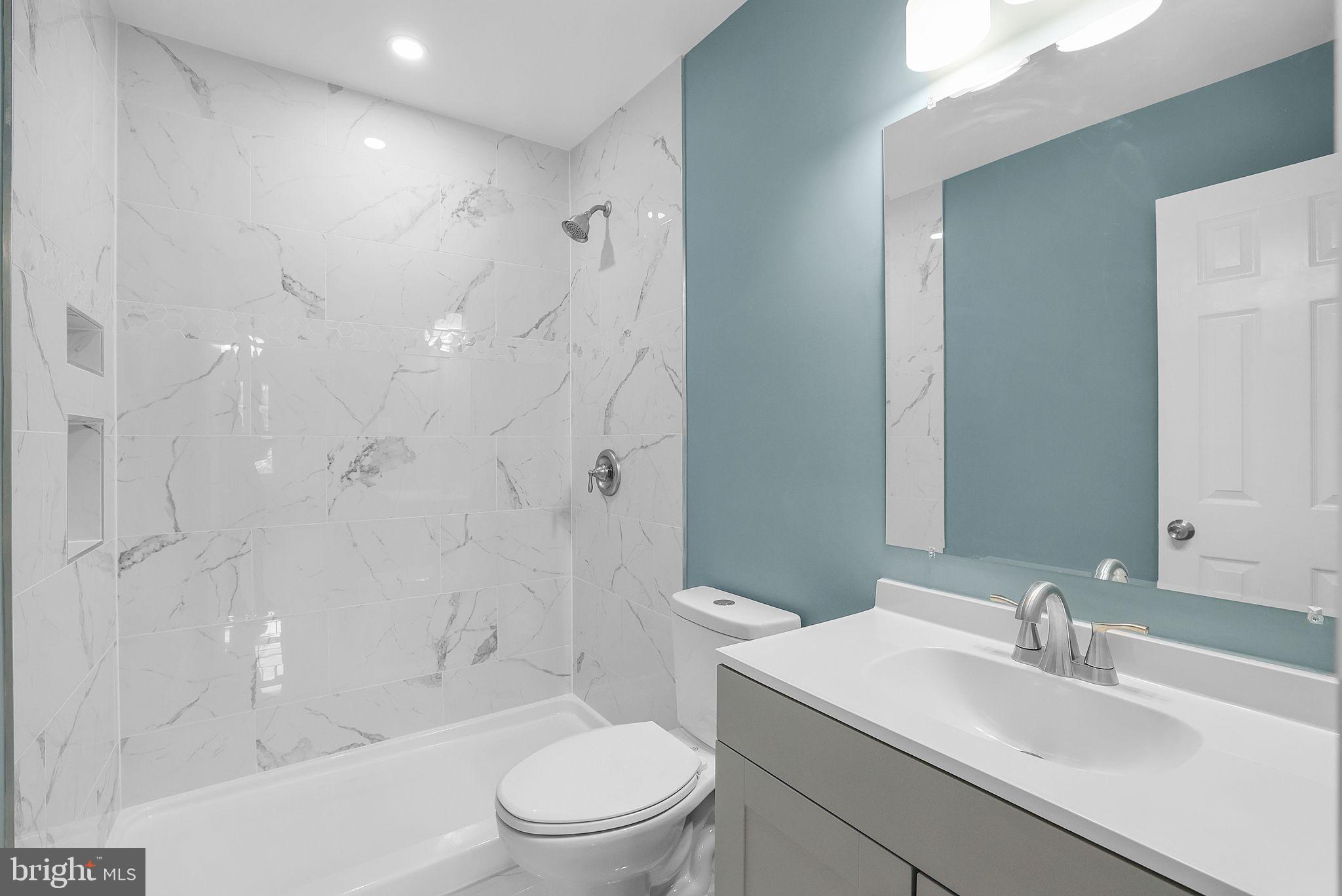 7760 Euclid Way Springfield, VA 22153 - Photo 24 of 50 a bathroom with a sink toilet and shower