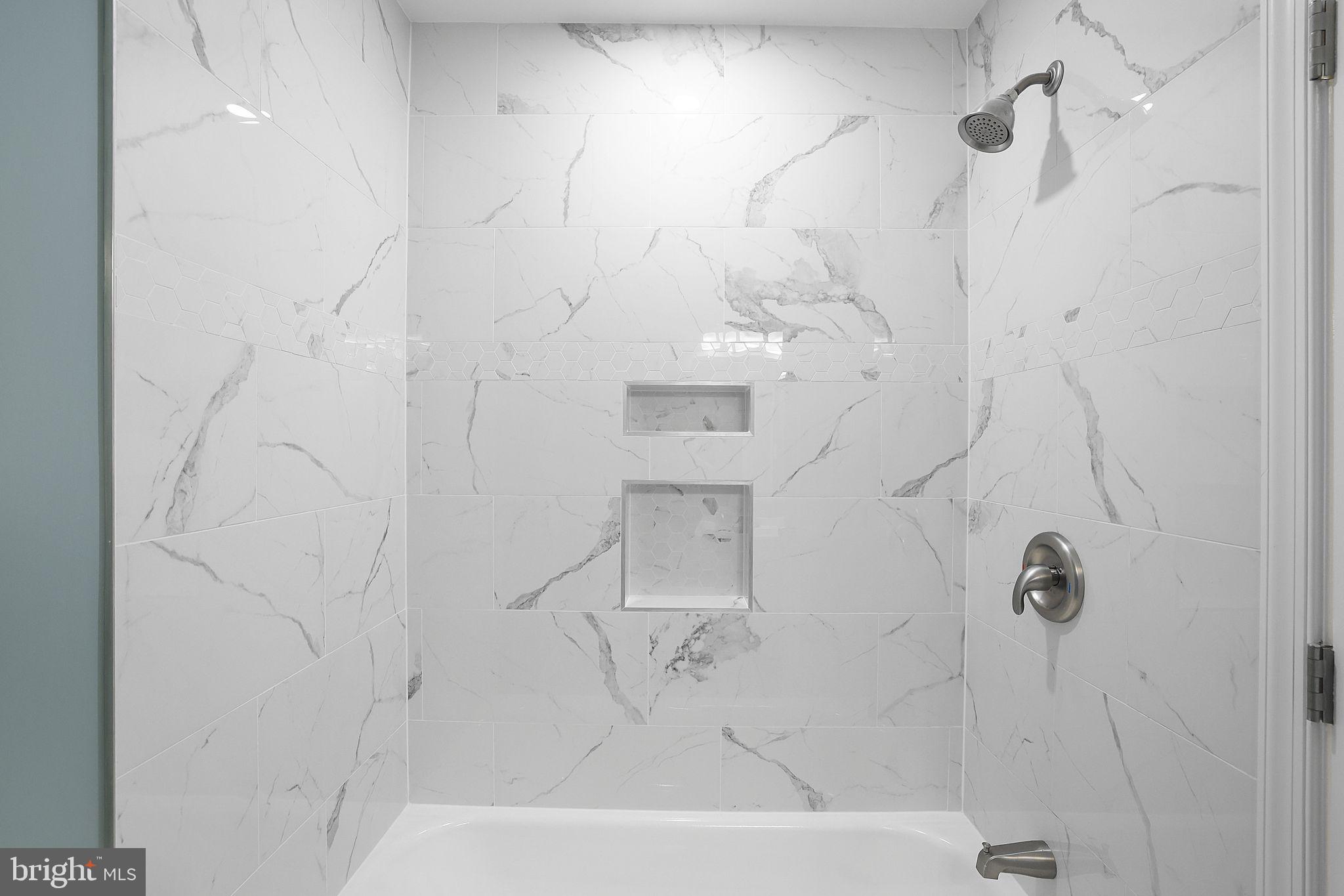 7760 Euclid Way Springfield, VA 22153 - Photo 32 of 50 a bathroom with a bathtub