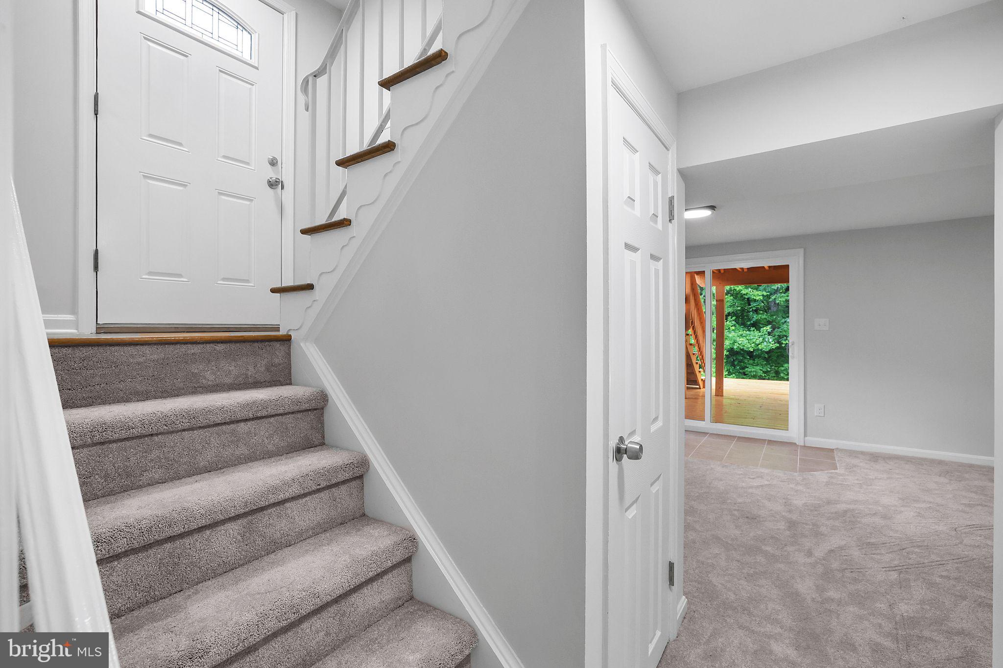 7760 Euclid Way Springfield, VA 22153 - Photo 33 of 50 a view of staircase with white walls and white walls