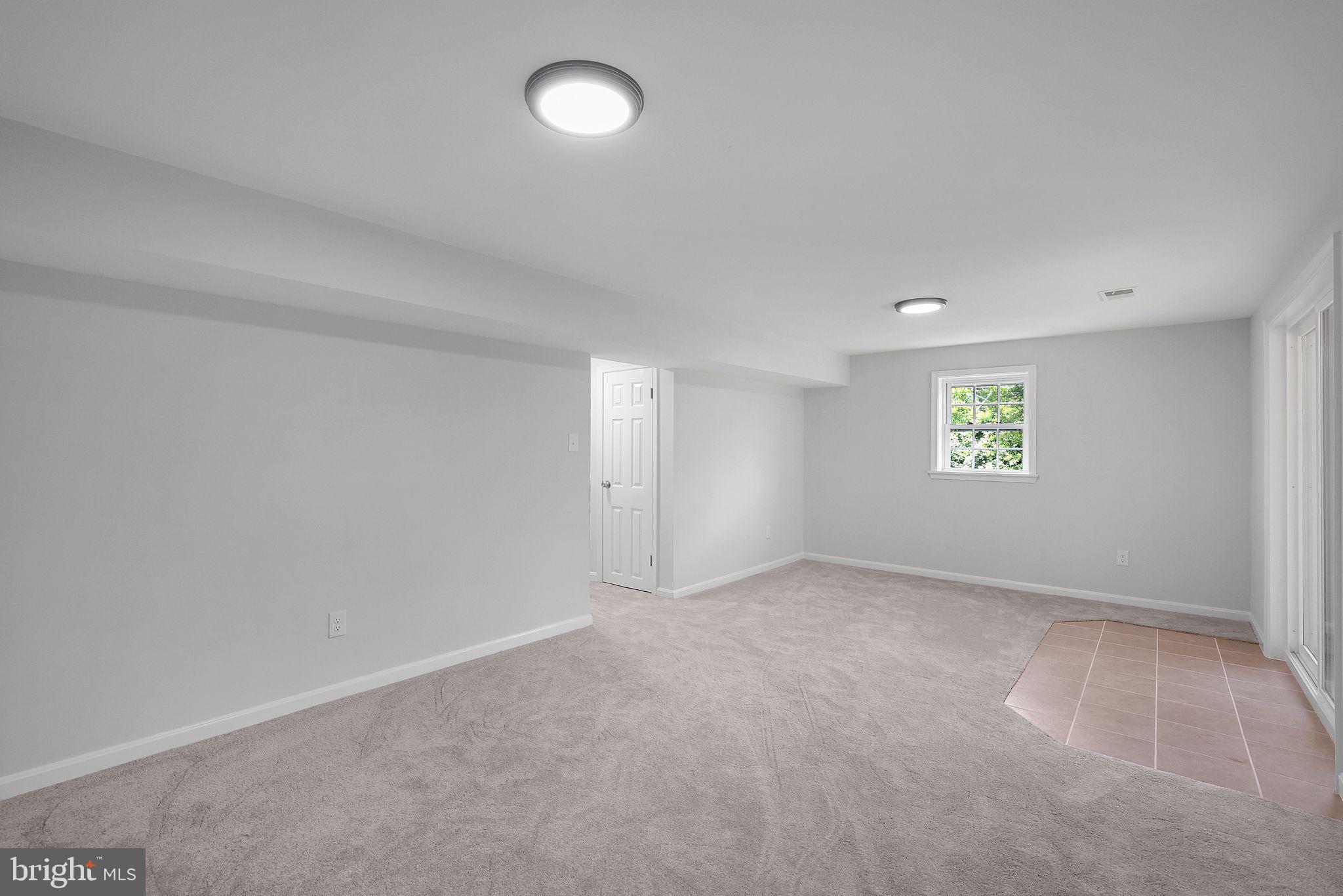 7760 Euclid Way Springfield, VA 22153 - Photo 36 of 50 an empty room with windows