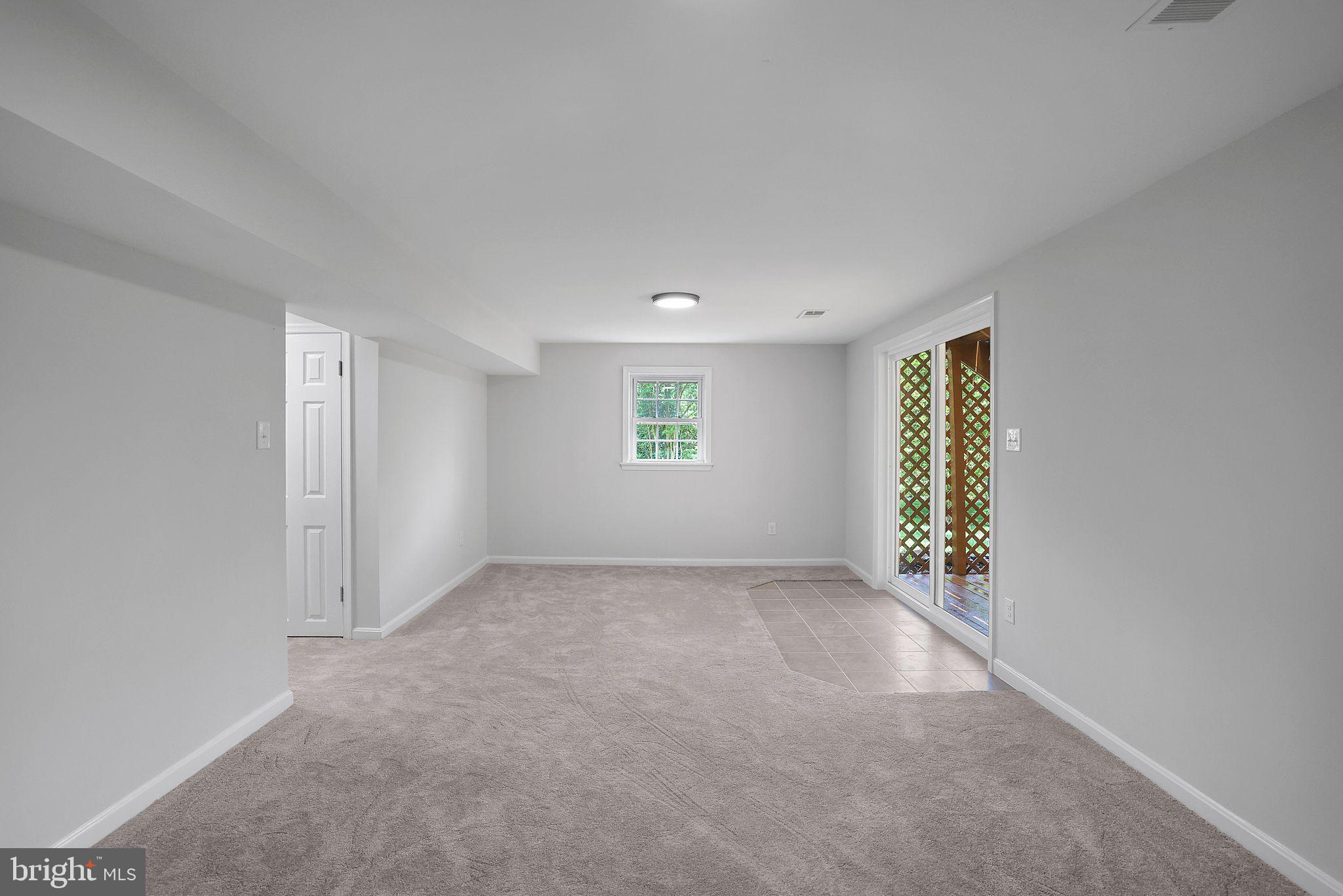 7760 Euclid Way Springfield, VA 22153 - Photo 37 of 50 an empty room with windows