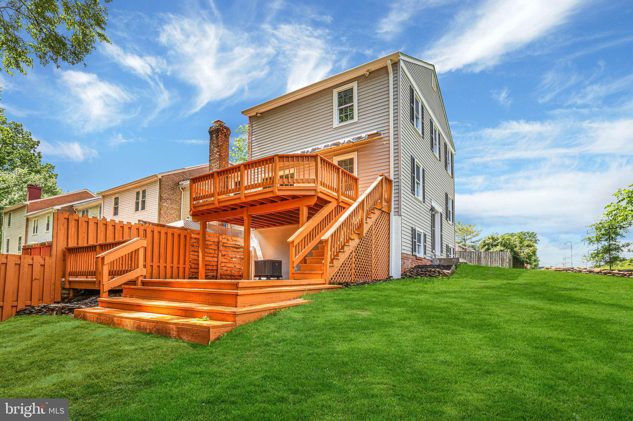 7760 Euclid Way Springfield, VA 22153 - Photo 46 of 50 a backyard of a house with table and chairs