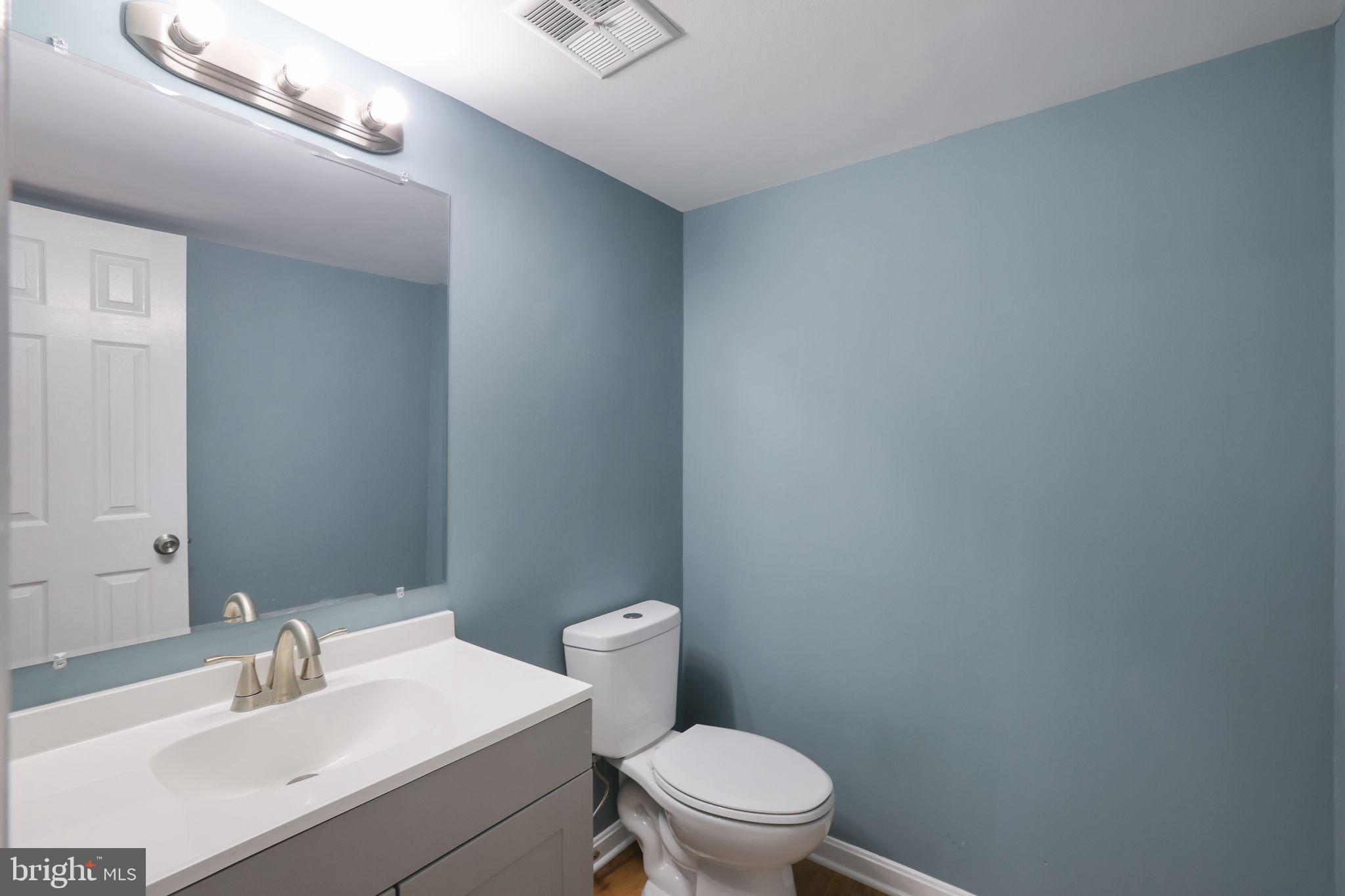 7760 Euclid Way Springfield, VA 22153 - Photo 9 of 50 a white toilet sitting next to a bathroom sink