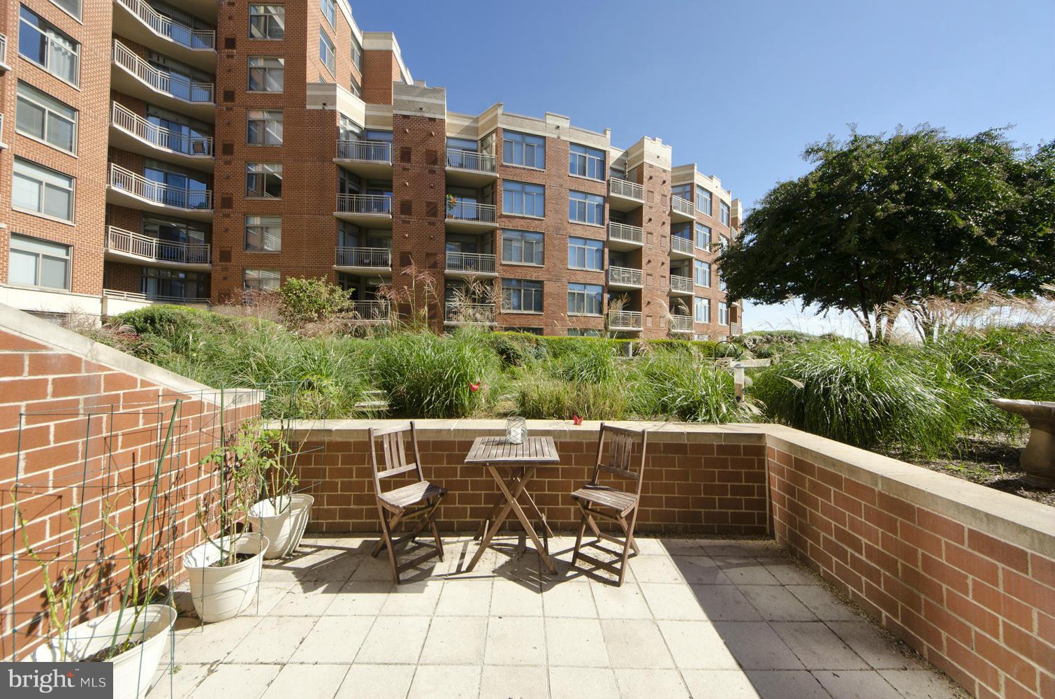 3600 South Glebe Road, Unit 235W Arlington, VA 22202 - Photo 1 of 30 a view of building with outdoor seating space