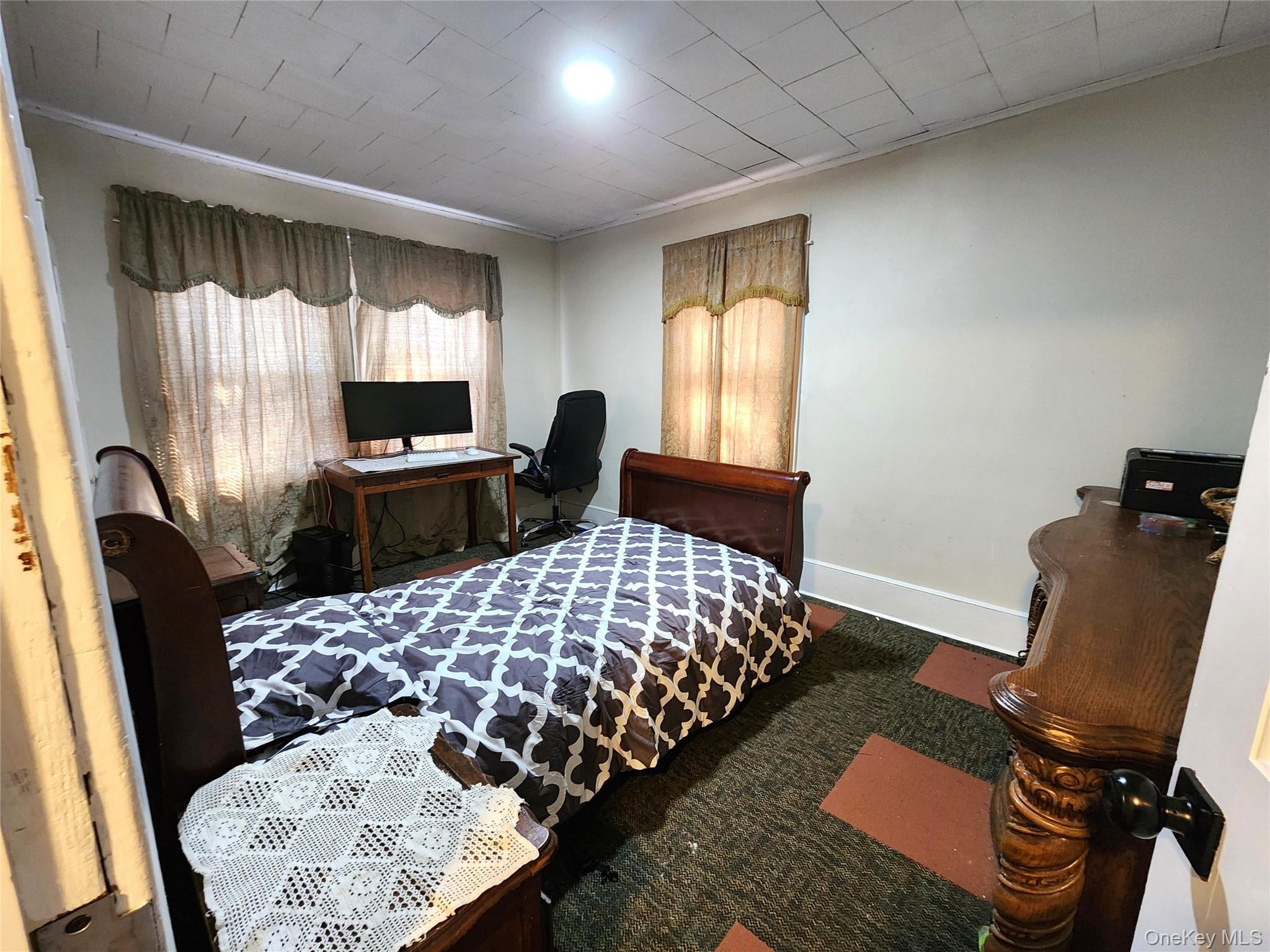 35 Youngs Hill Road Liberty, NY 12754 - Photo 19 of 32 a bedroom with a bed and wooden floor