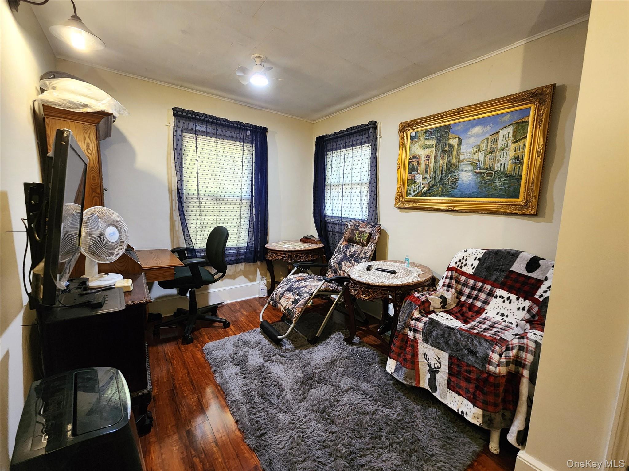 35 Youngs Hill Road Liberty, NY 12754 - Photo 20 of 32 a living room with furniture a rug and a window