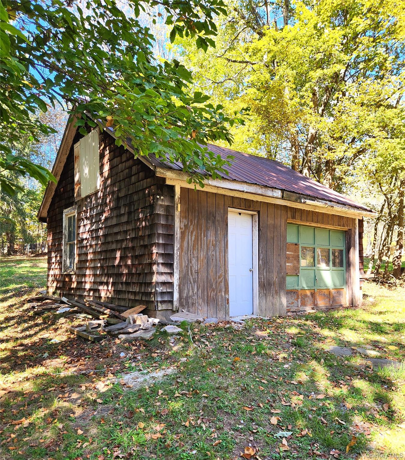 35 Youngs Hill Road Liberty, NY 12754 - Photo 27 of 32 a backyard of a house with barbeque oven