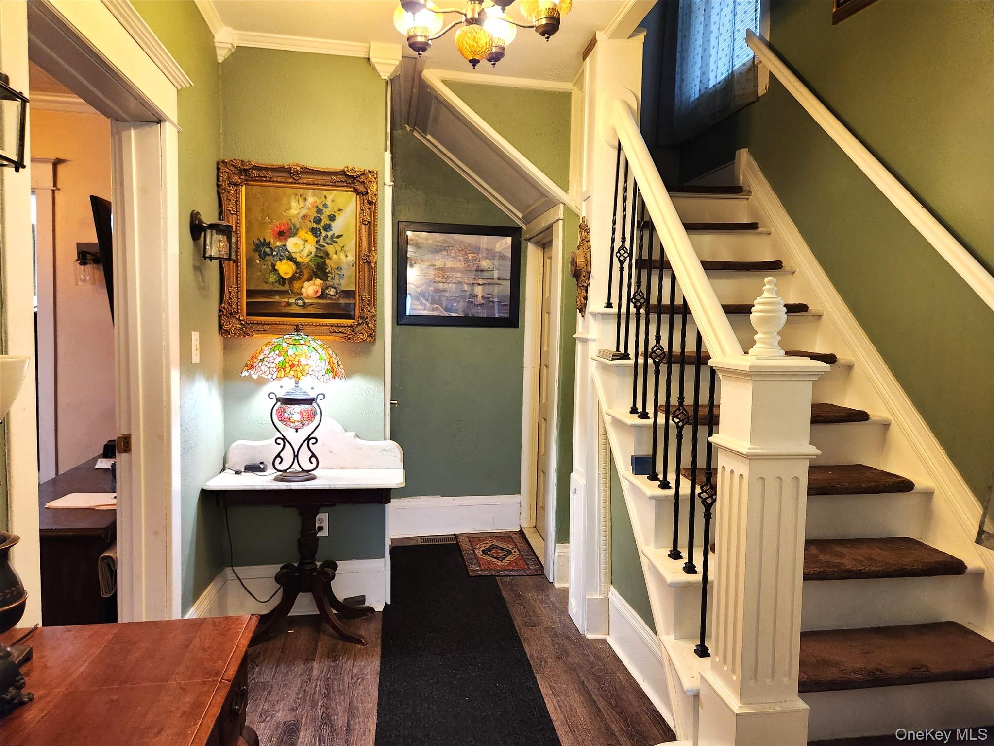 35 Youngs Hill Road Liberty, NY 12754 - Photo 4 of 32 a view of an entryway with wooden floor and stairs