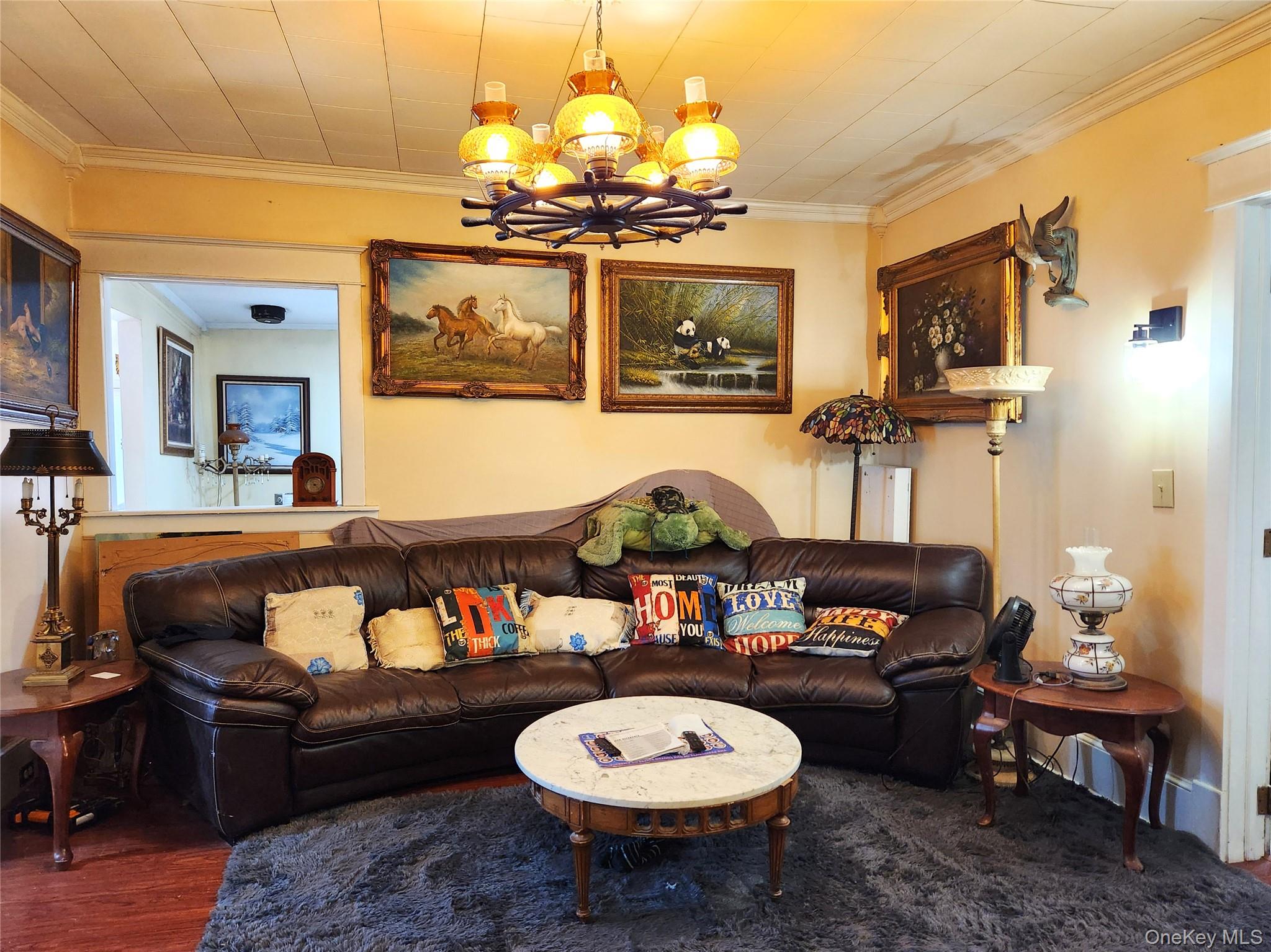 35 Youngs Hill Road Liberty, NY 12754 - Photo 5 of 32 a living room with furniture a flat screen tv and kitchen view