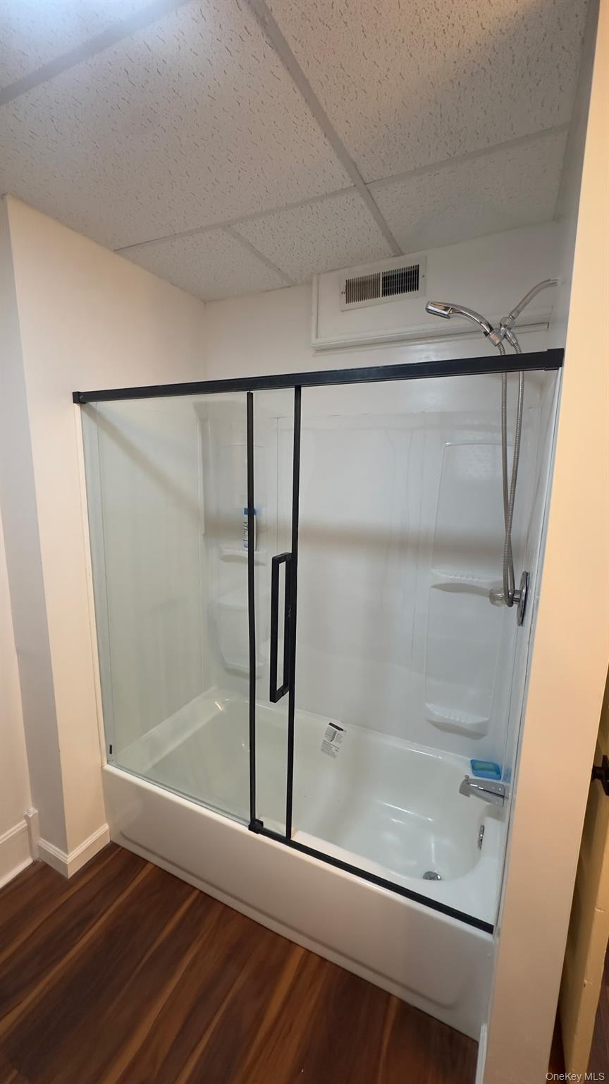 35 Youngs Hill Road Liberty, NY 12754 - Photo 9 of 32 a bathroom with a glass shower door