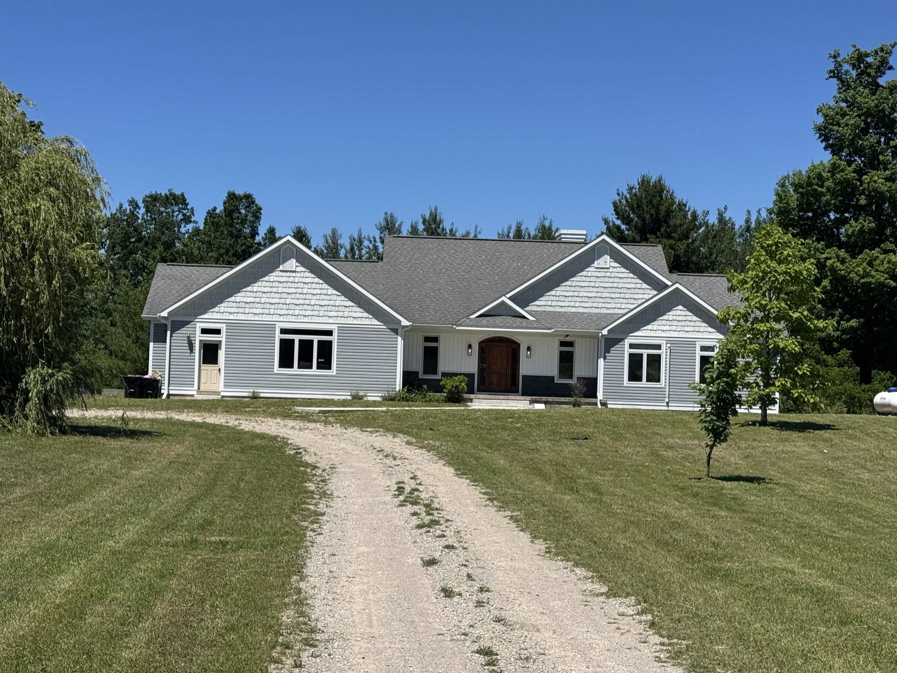 8255 Angell Road Williamsburg, MI 49690 - Photo 1 of 17 1947611-c7ebb15f-cb88-4089-b11f-6ee767125937.JPG