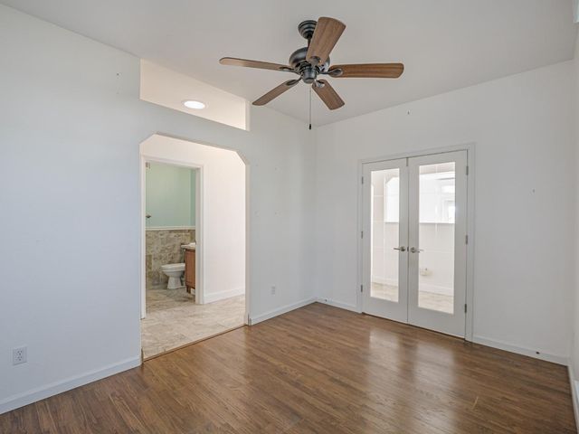 a view of a hallway with a glass door