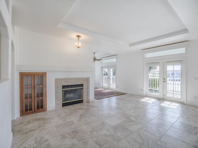 a view of an empty room and window