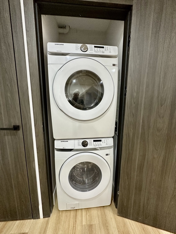 100 Mt Pleasant Avenue, Unit 4 Boston, MA 02119 - Photo 14 of 15 a utility room with dryer and washer