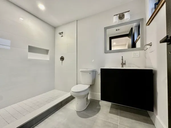 a bathroom with a sink and a toilet