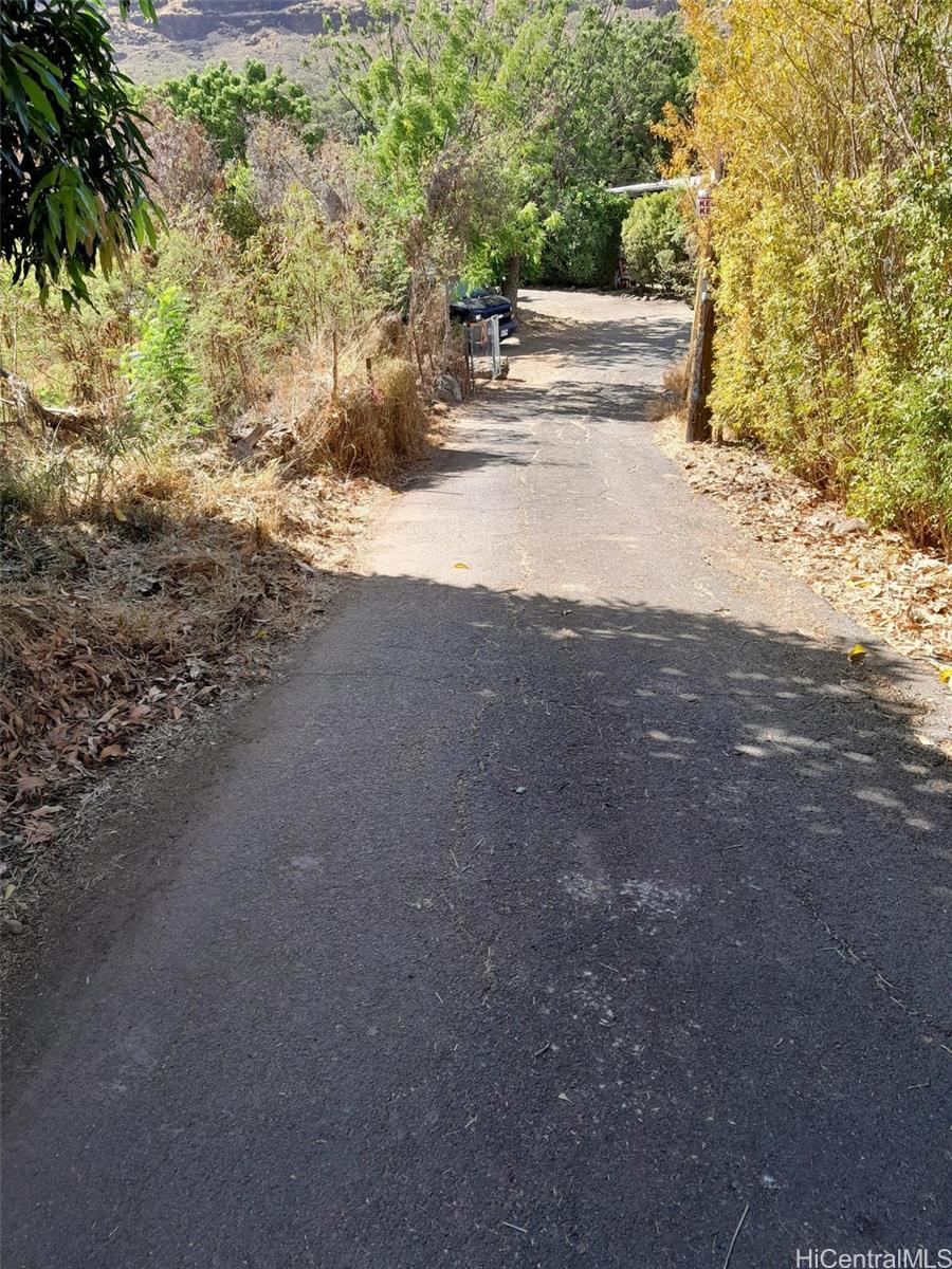85-775A Waianae Valley Road Waianae, HI 96792 - Photo 16 of 25 a view of road with large trees