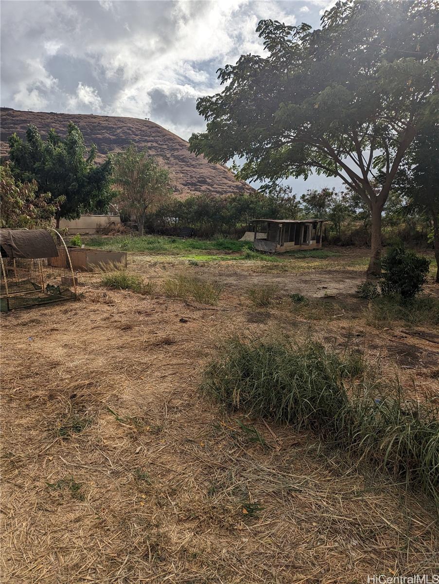 85-775A Waianae Valley Road Waianae, HI 96792 - Photo 23 of 25 a view of outdoor space with trees all around
