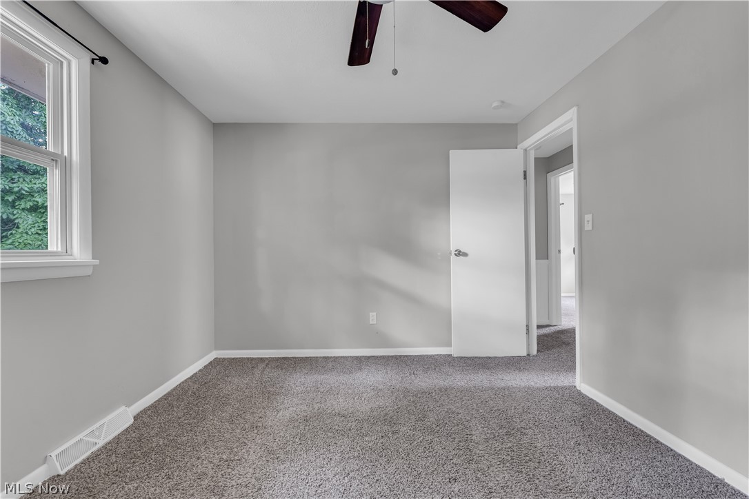 8043 Munson Road Mentor, OH 44060 - Photo 26 of 27 Carpeted spare room with ceiling fan