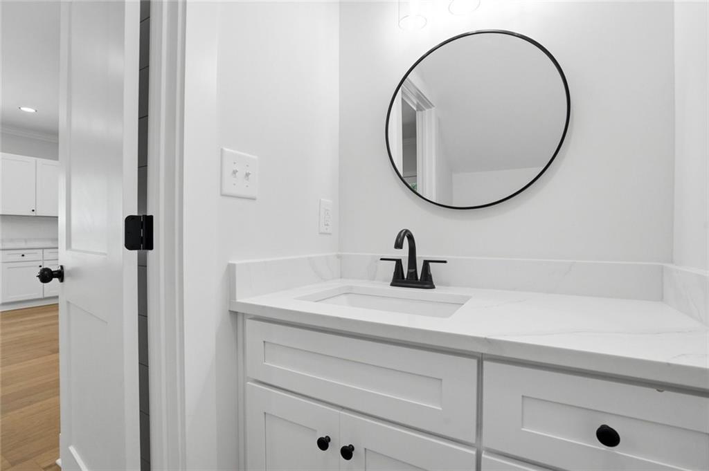134 Henry Meyer Road Winterville, GA 30683 - Photo 16 of 34 a bathroom with a sink and a mirror
